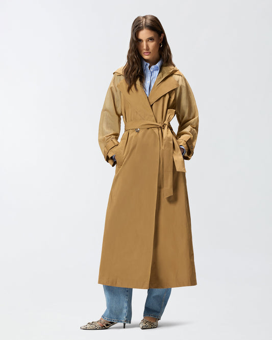 Trench coat with sheer inserts
