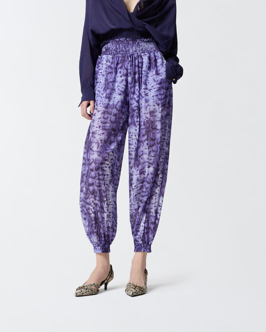 Wide-leg trousers with snake print
