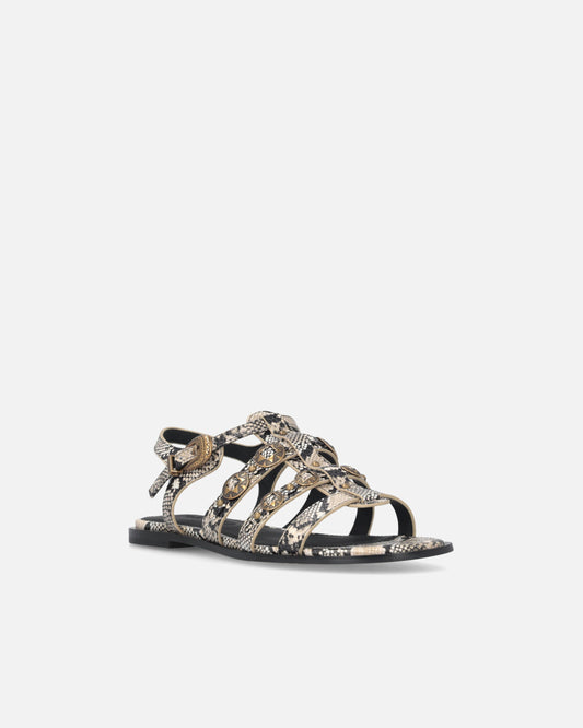Flat leather sandals with python print and studs
