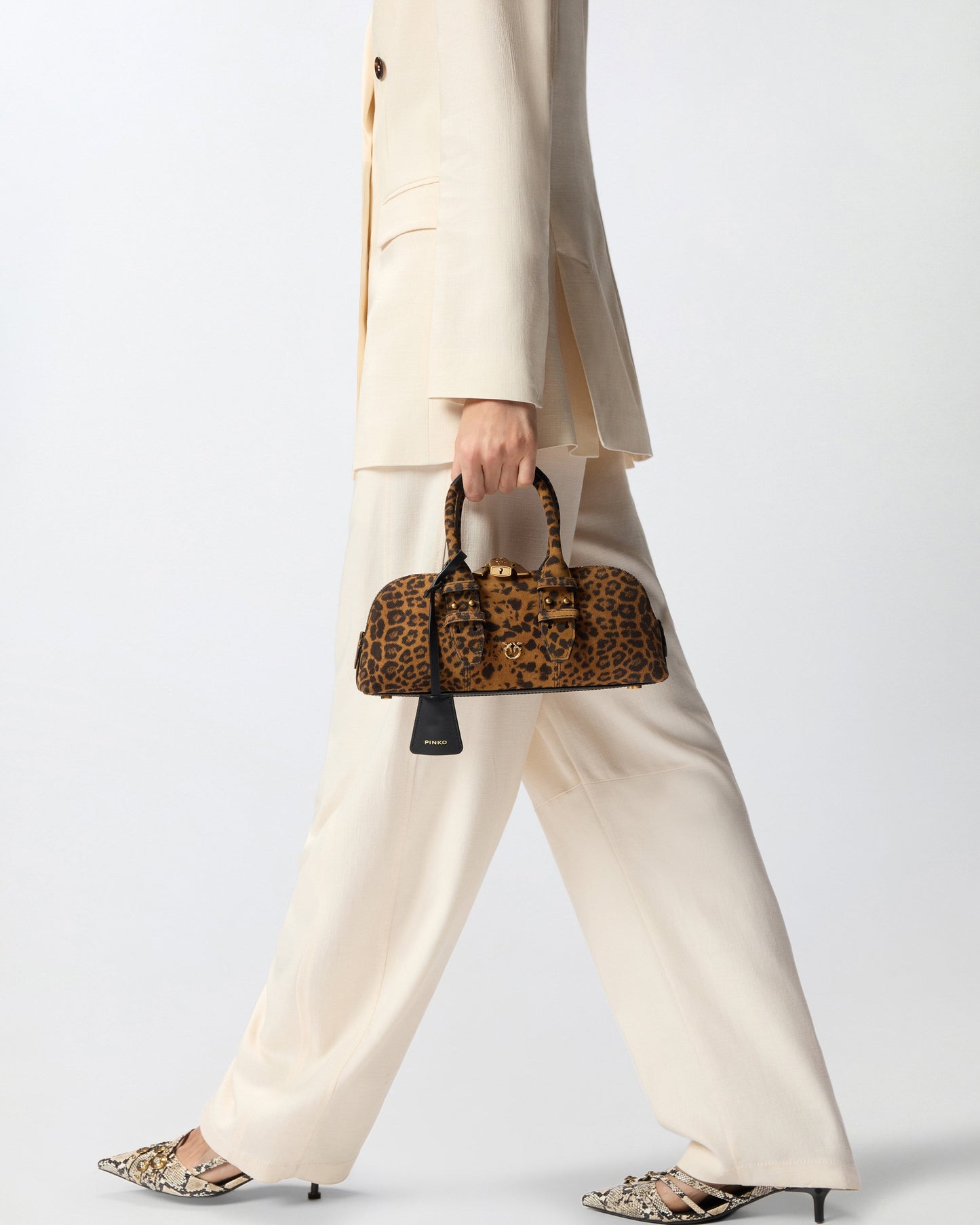 Suede handbag with macula print