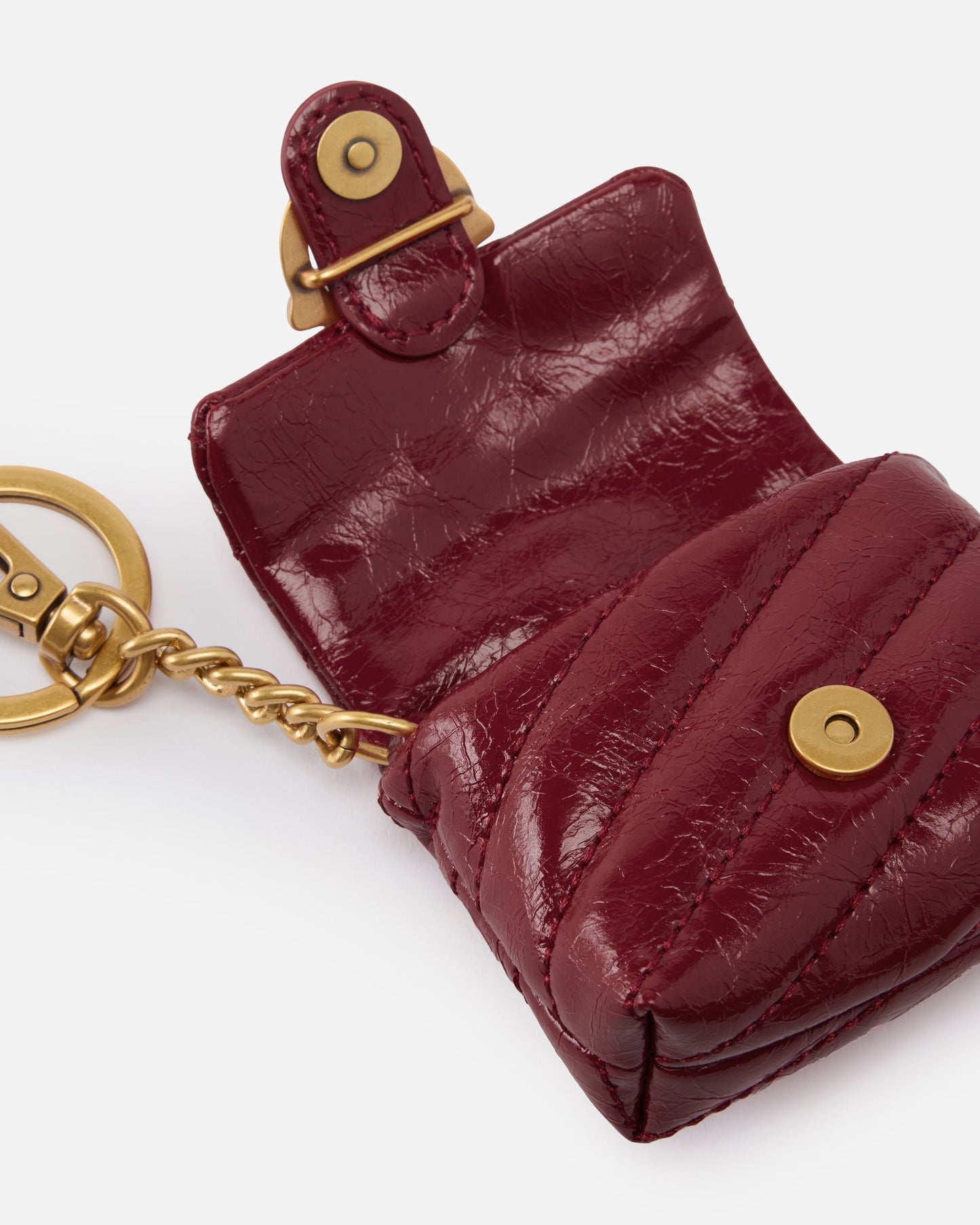 Love Bag Puff AirPods case in shiny leather