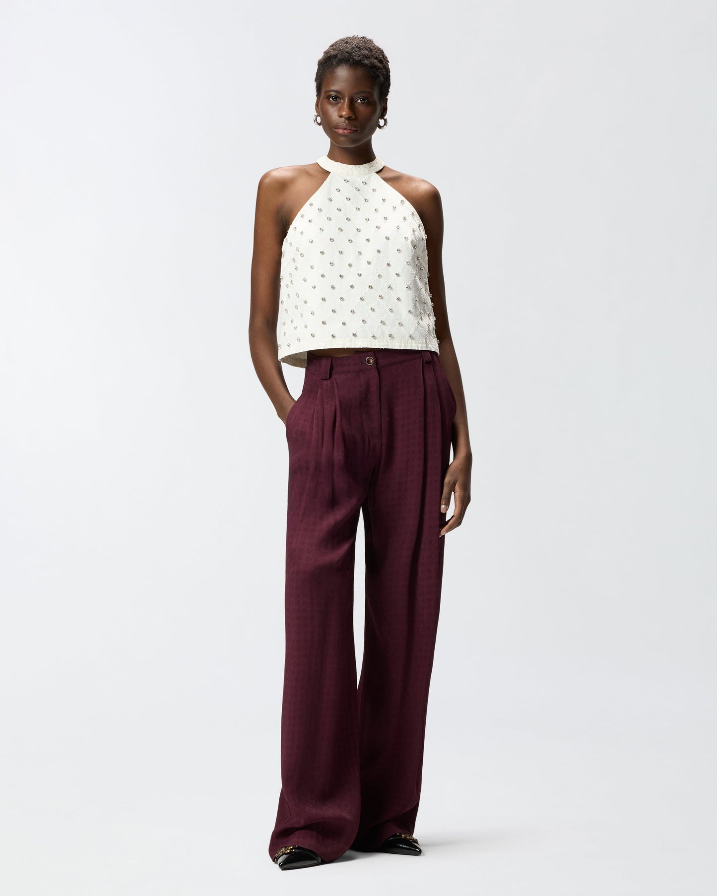 Trousers in jacquard with tie motif