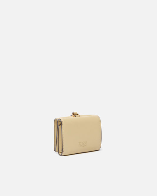 Compact leather wallet with wristlet