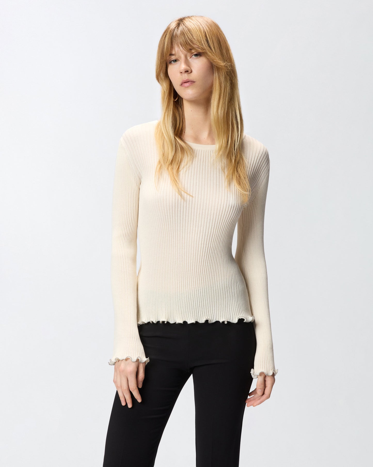 Ribbed sweater with jewel edges