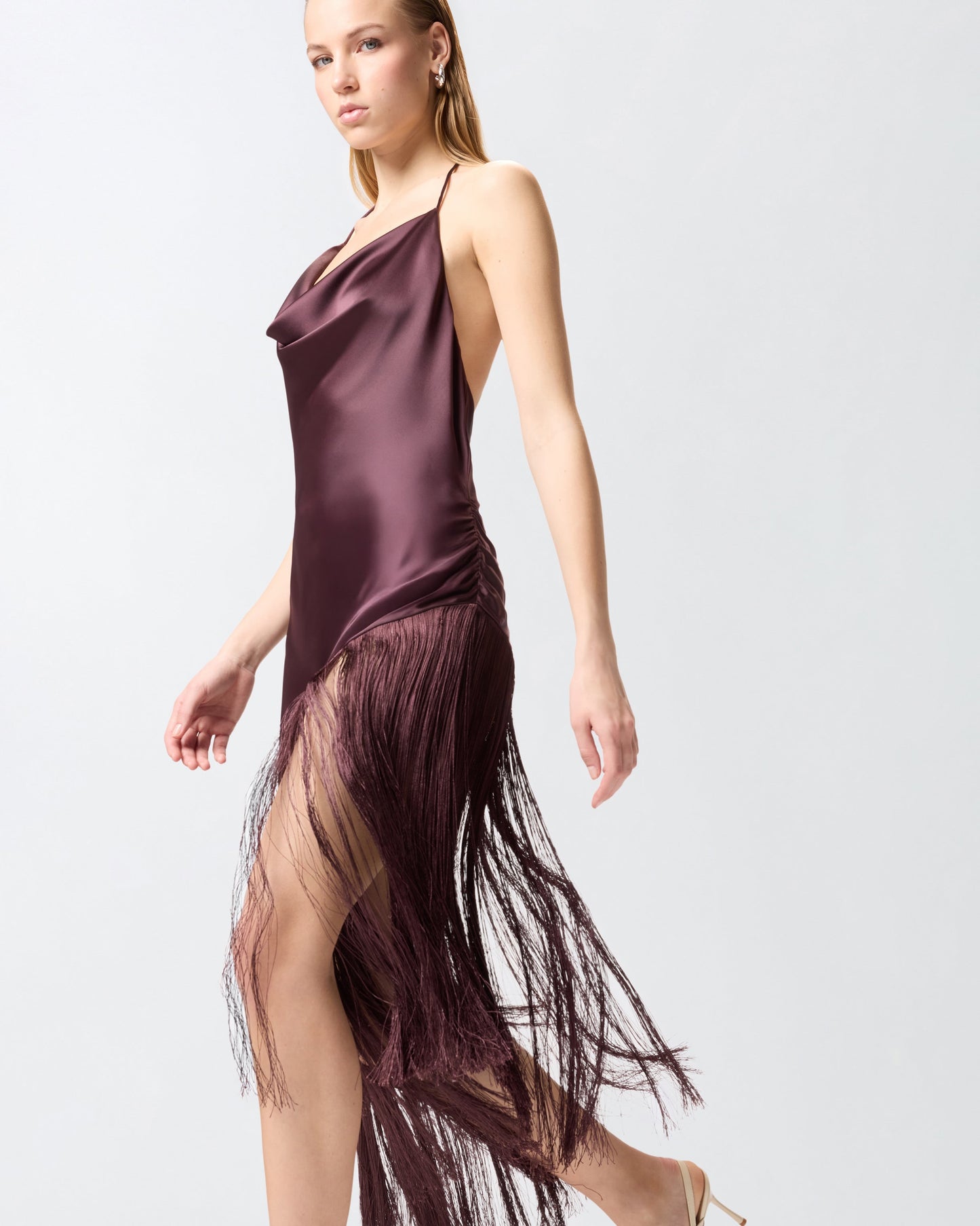 Asymmetrical top in satin with fringes