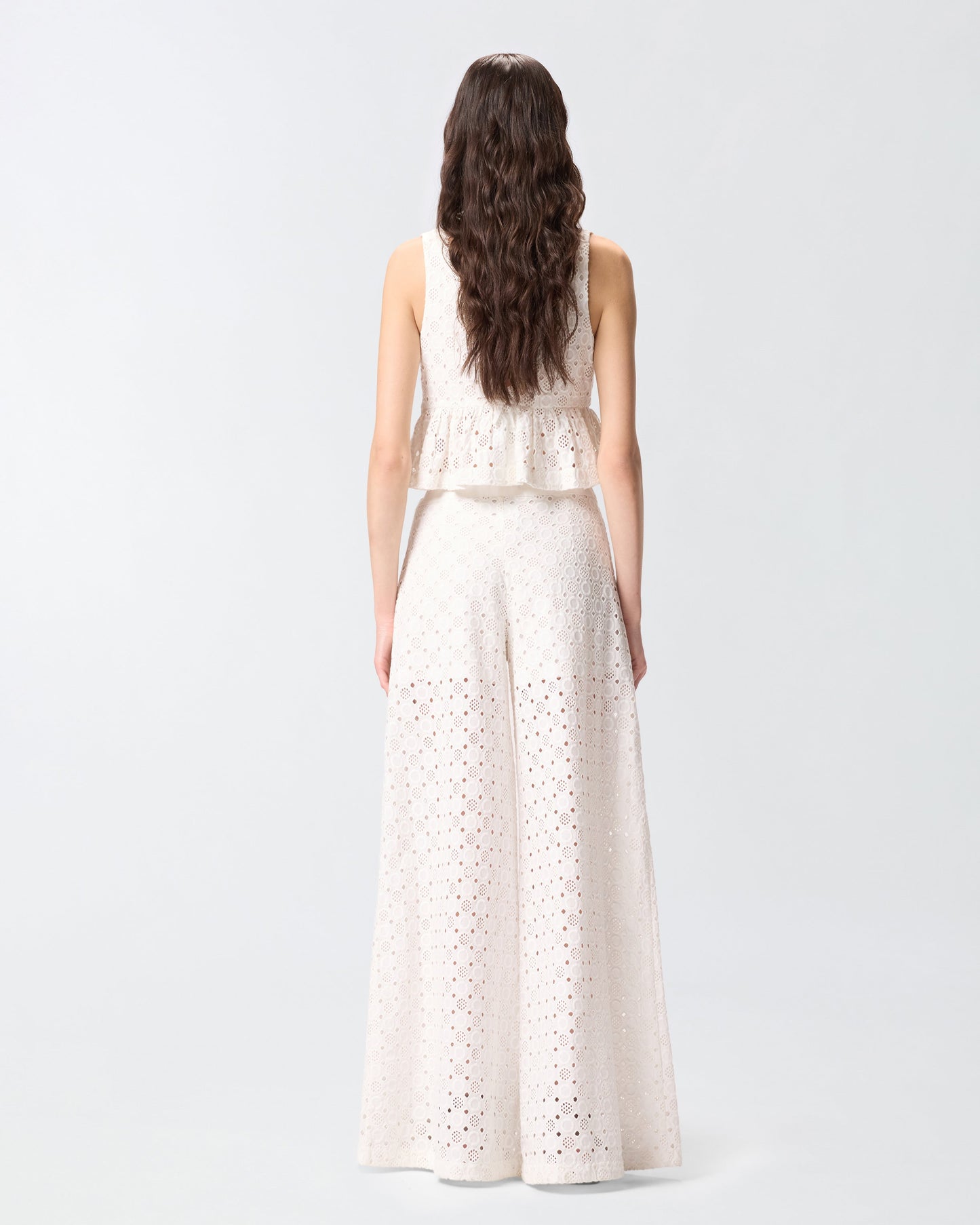 Trousers with openwork motif
