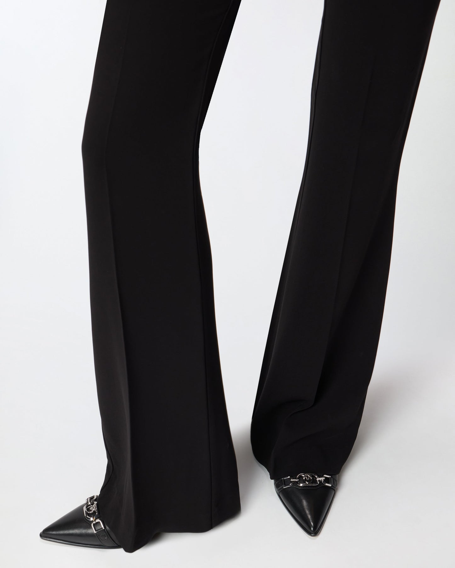 Flared trousers with pressed pleat detail