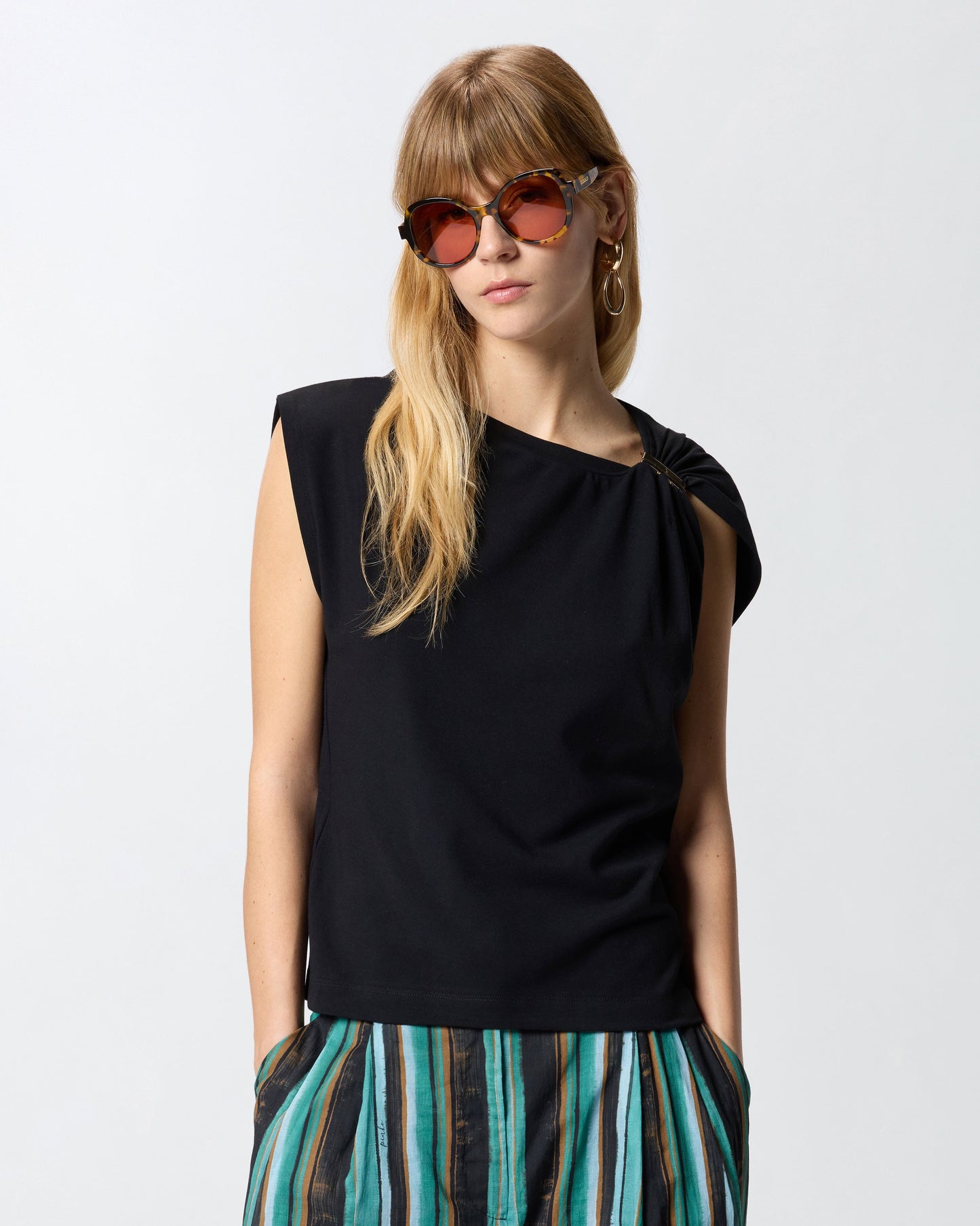 Top with golden detail