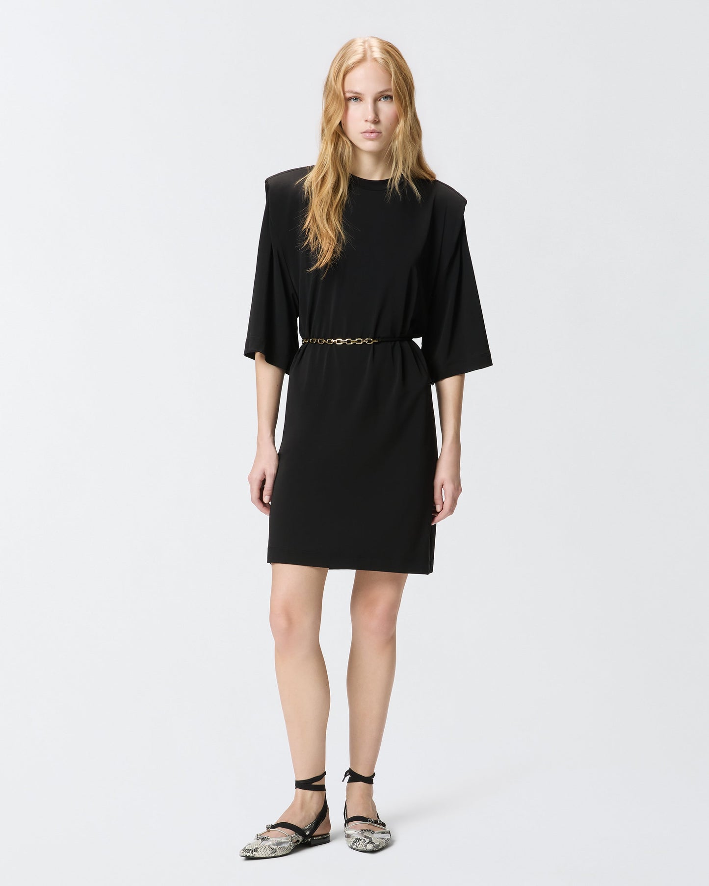Mini dress with structured shoulders and chain