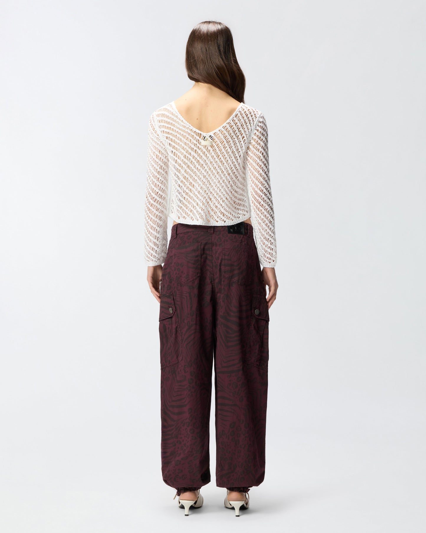Crochet effect sweater with sequins