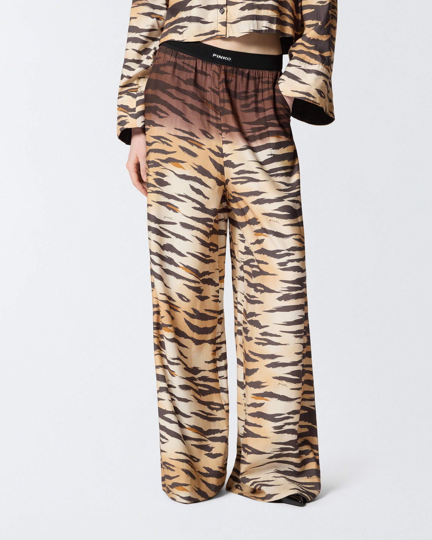 Fluid trousers with tiger print