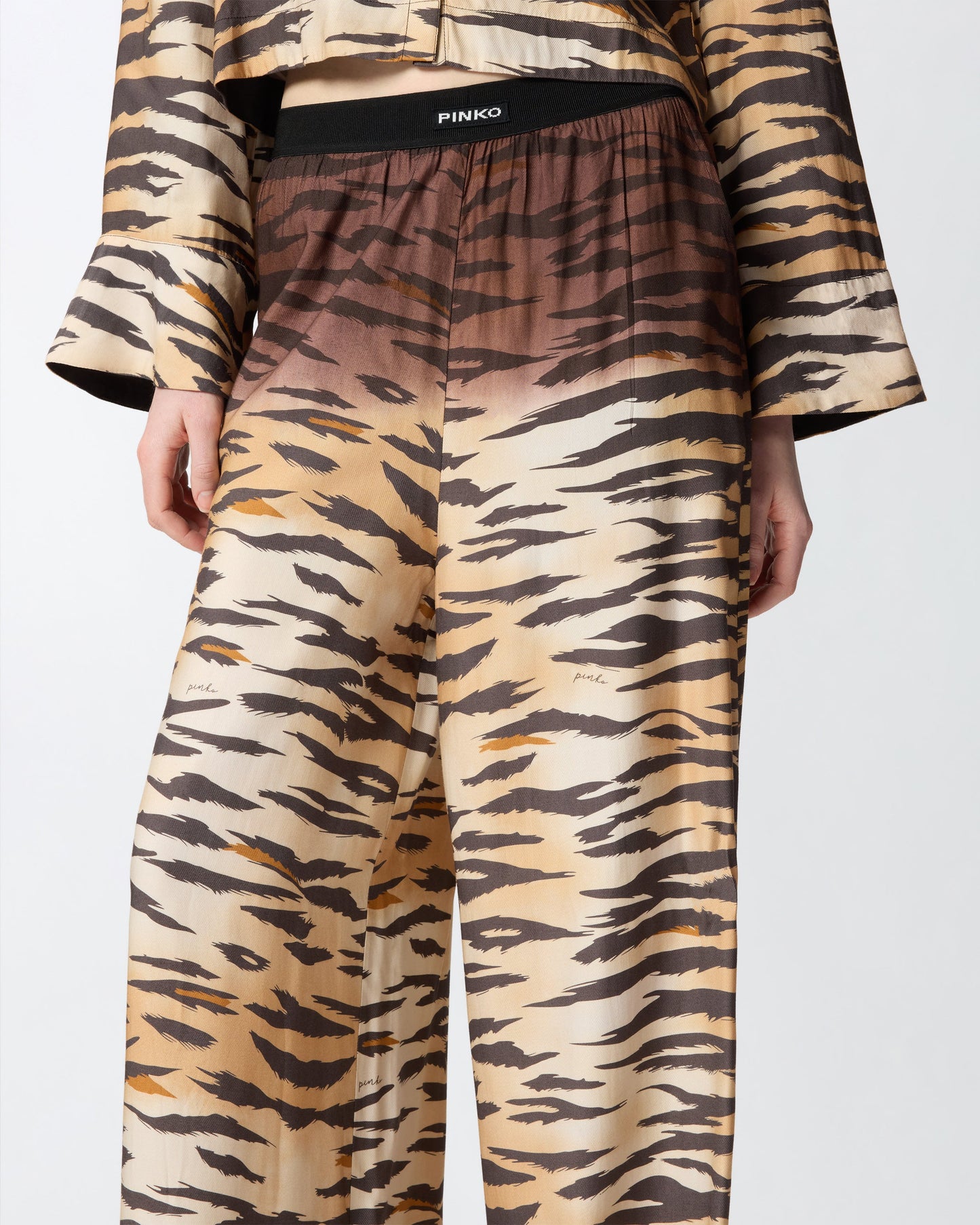 Fluid trousers with tiger print