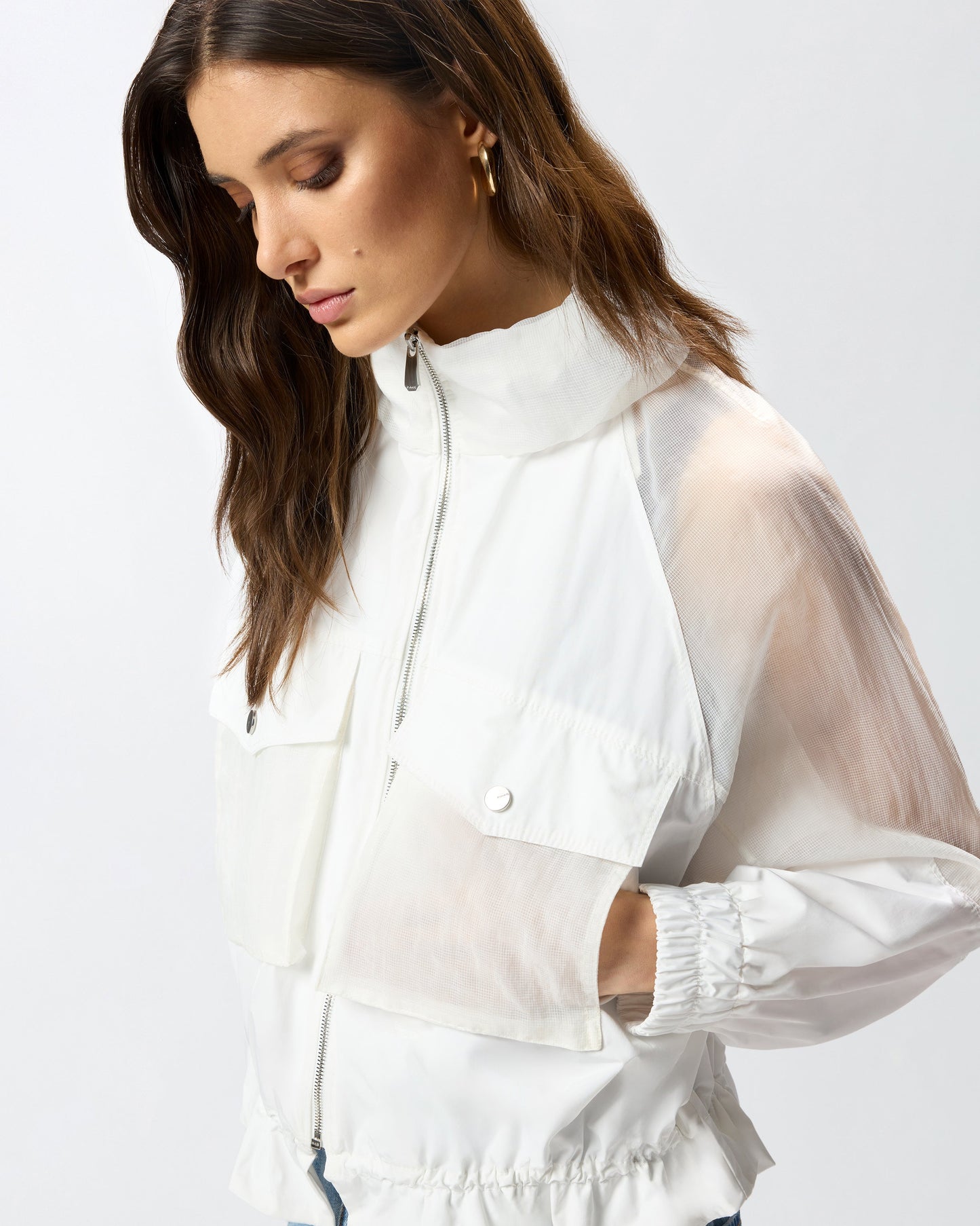 Technical jacket with sheer inserts