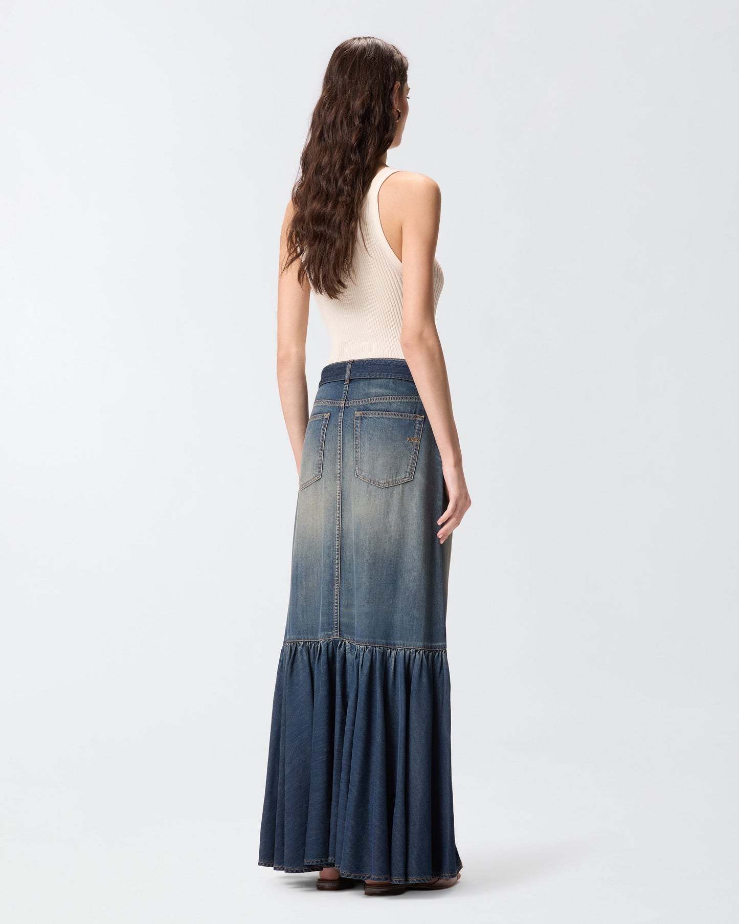 Long denim skirt with flounce and belt