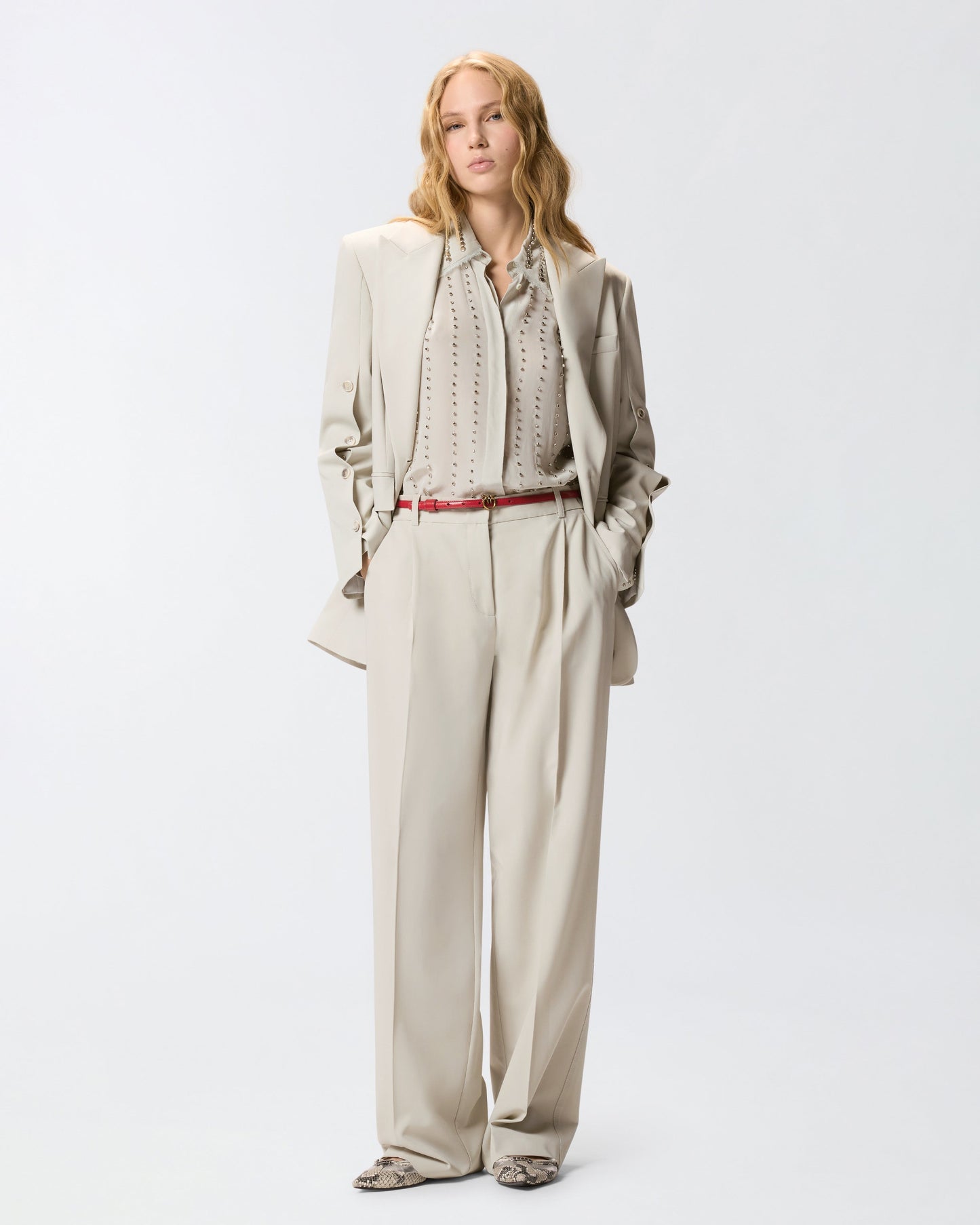 Flowing trousers with pressed pleat detail