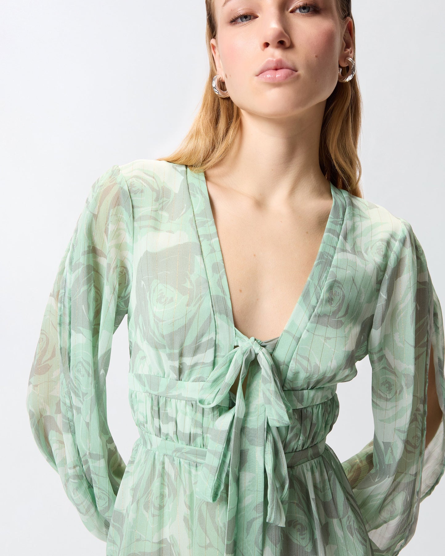 Mini dress with rose print and bow