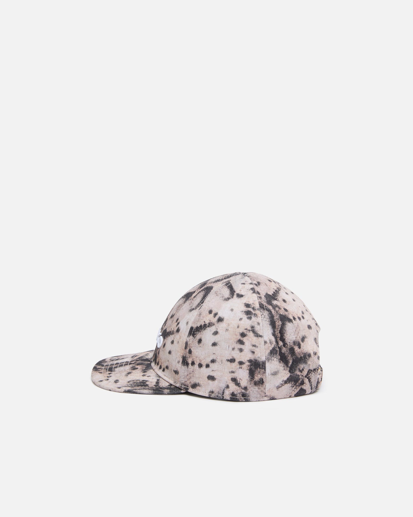 Cap with peak and snake print