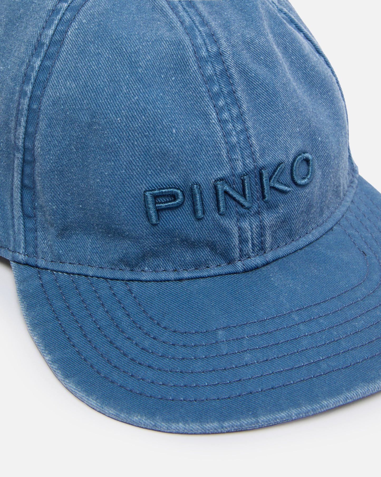 Cap with peak and fading