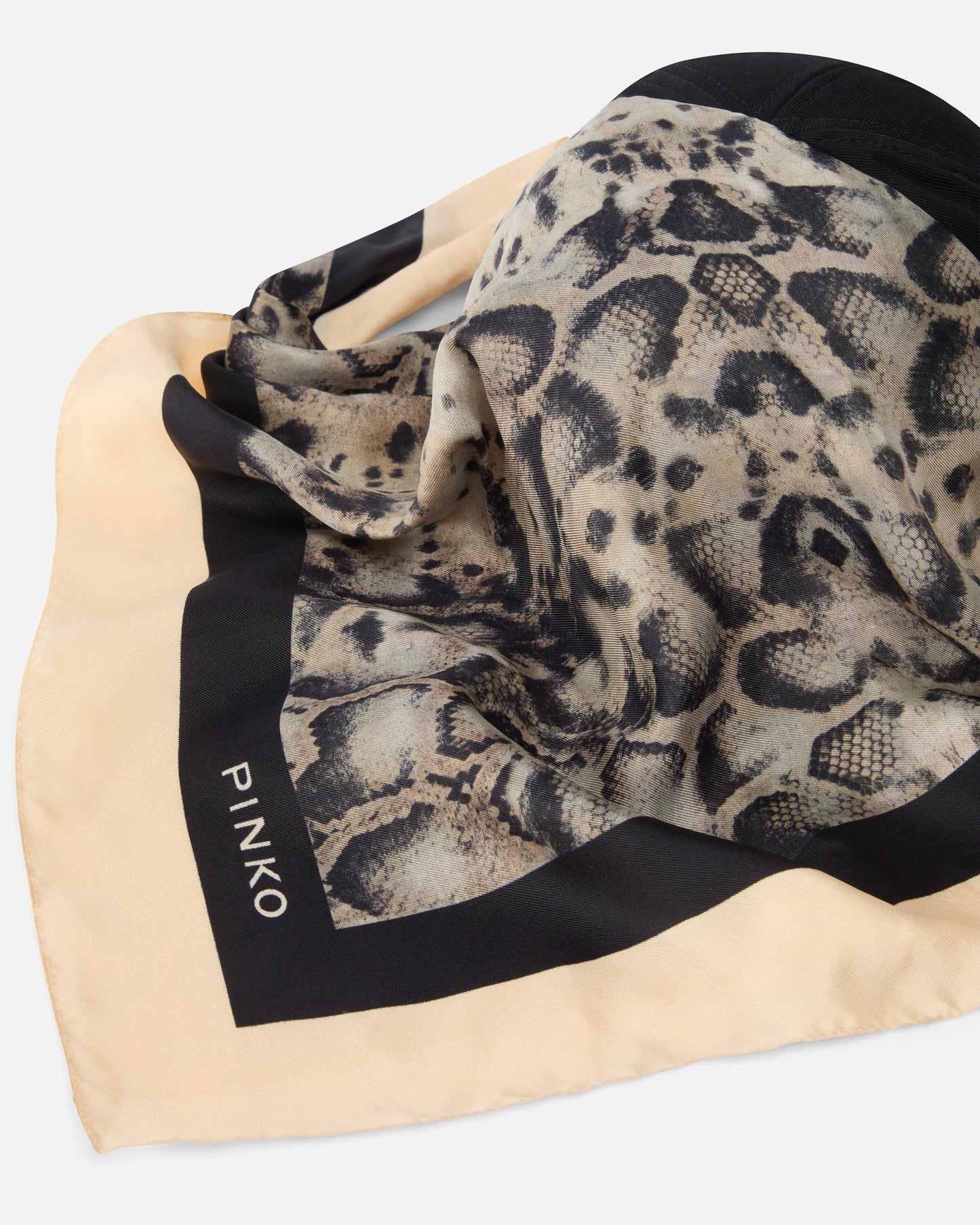 Baseball cap with animal print scarf