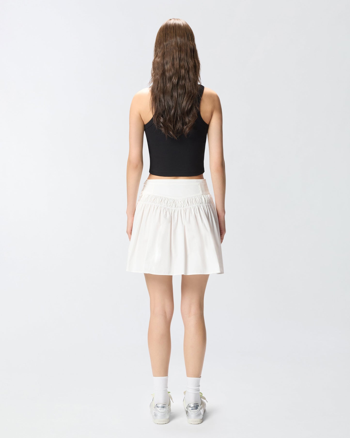 Short skirt with gathering and drawstring