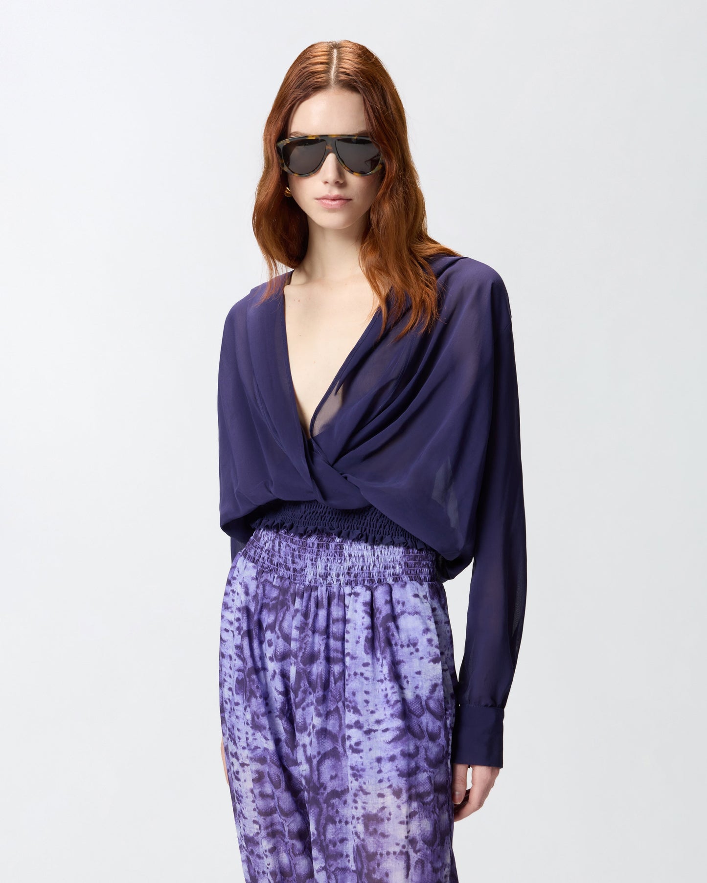 Cropped blouse with hood and sheer details