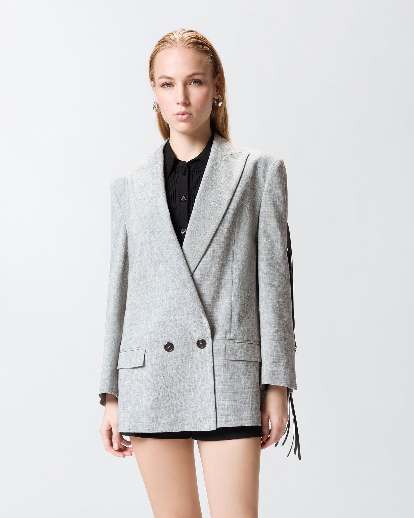 Double-breasted jacket with fringing