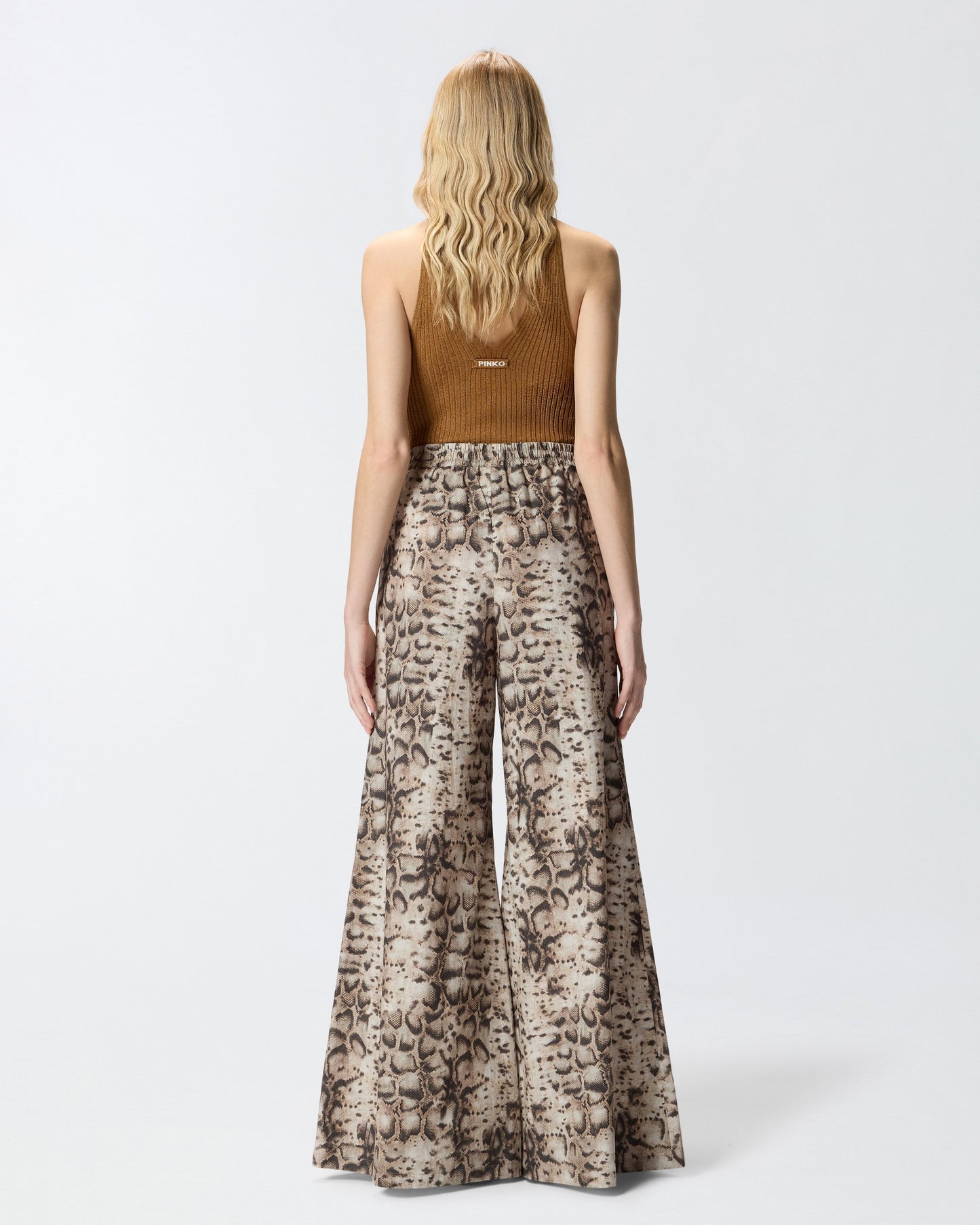 Wide-leg trousers with snake print