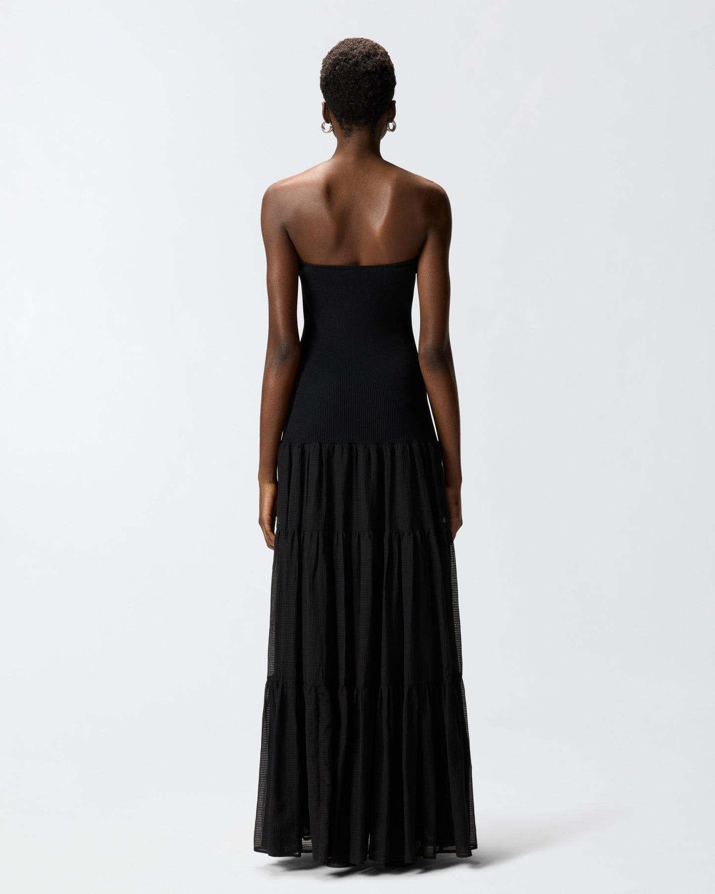 Long dress with ribbed top and flounced skirt