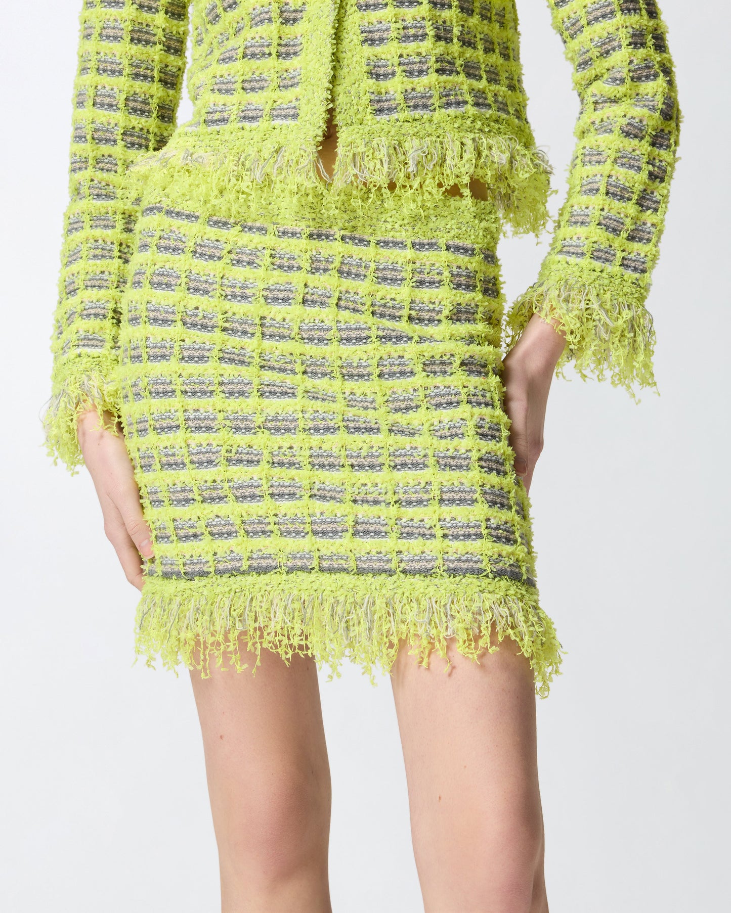 Mini skirt in basketweave and frayed knit