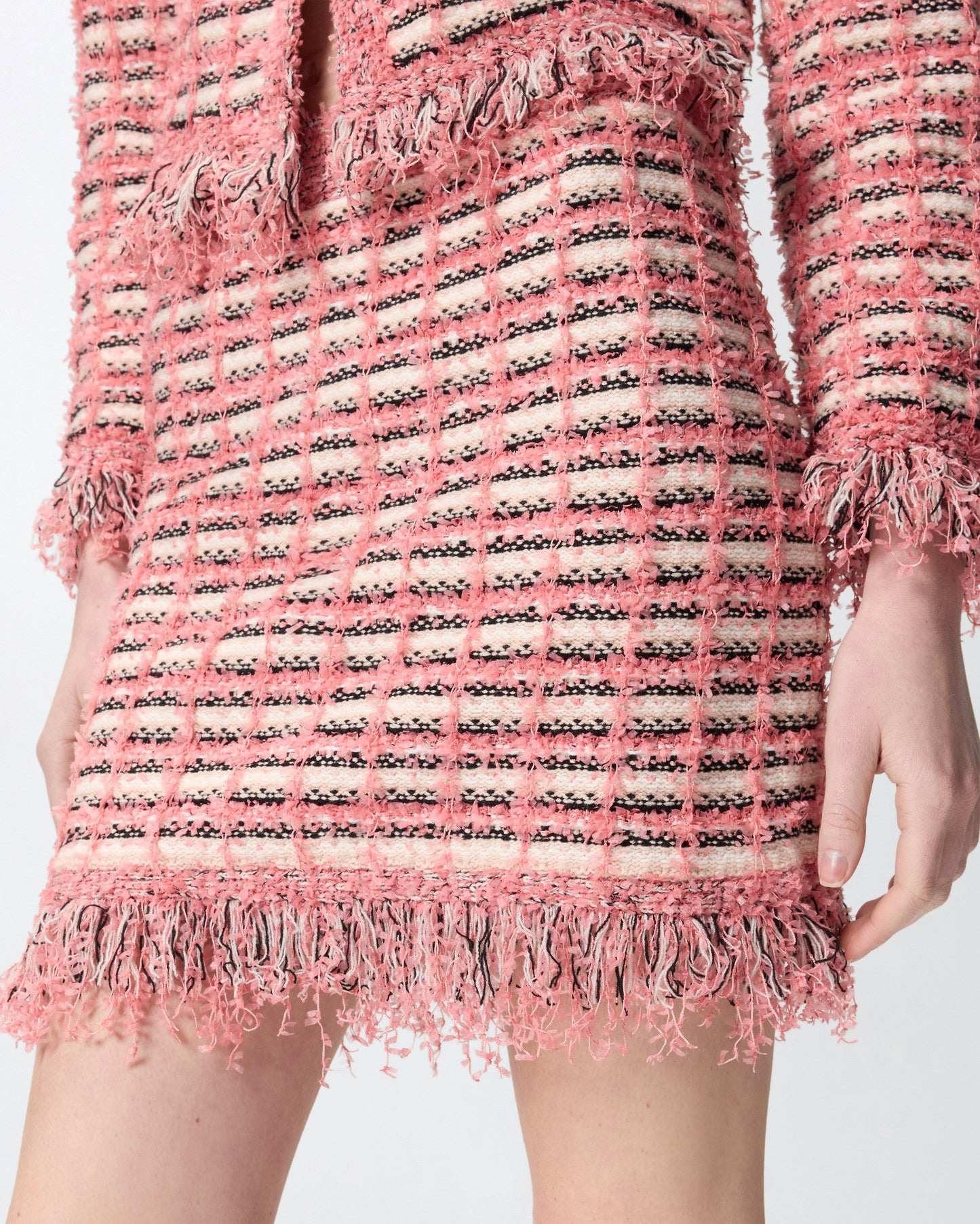 Mini skirt in basketweave and frayed knit