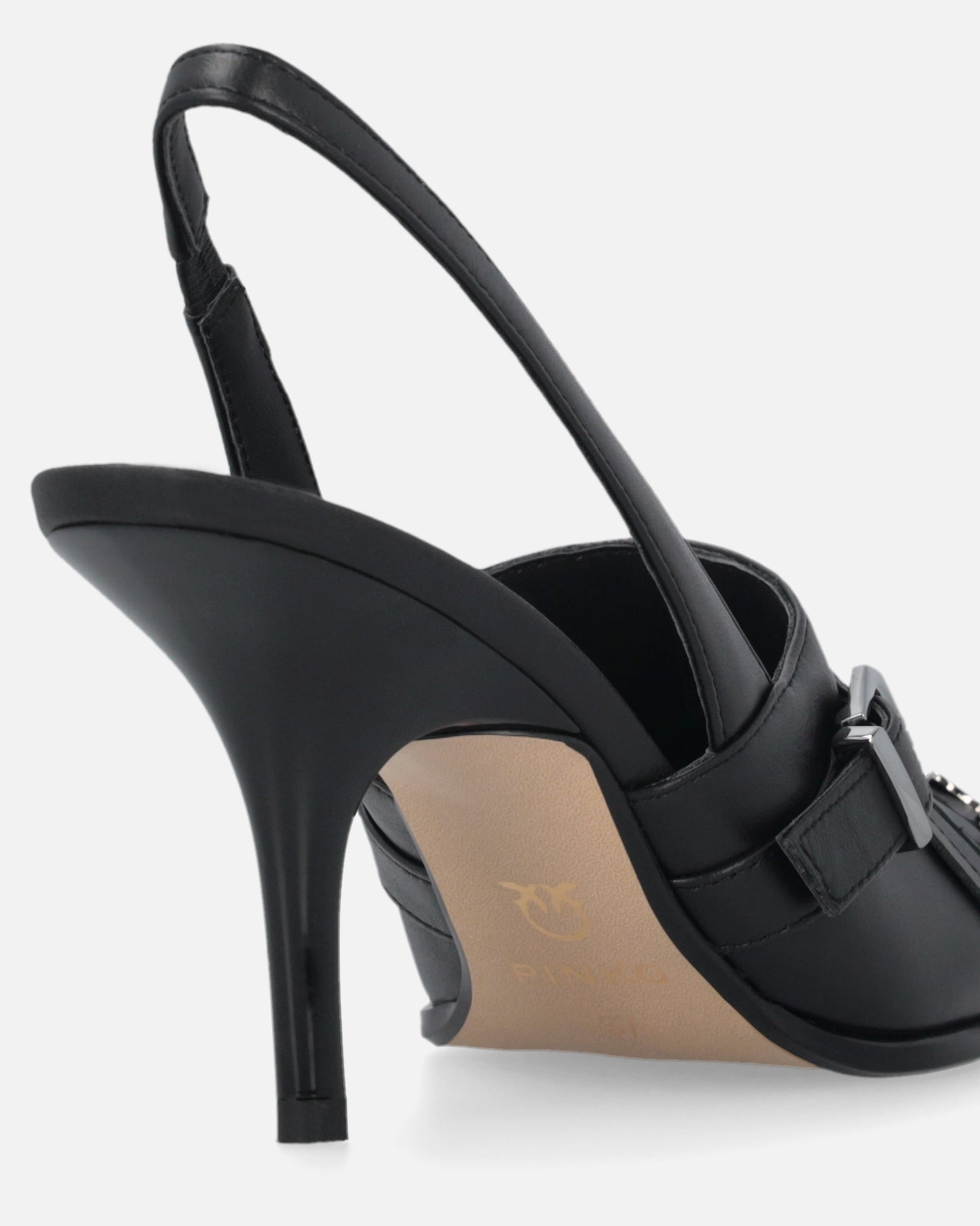 Leather slingbacks with saddlery-inspired details